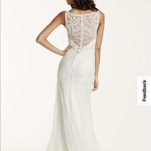 Never worn size 4 wedding dress with veil